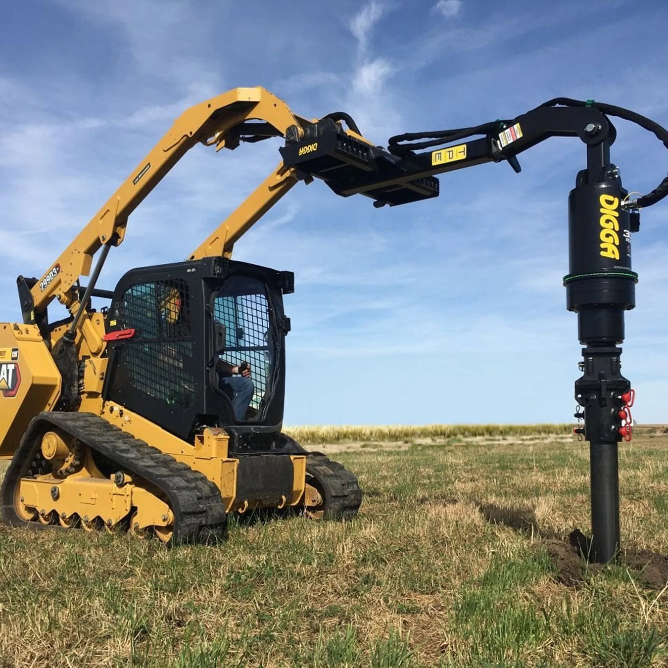 Track Loader with Digga Auger Attachment and Extension Mounting Bracket